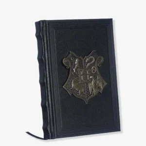 CADERNO DE ANOTACOES C/APLIQUE BRASAO METAL HOGWARTS